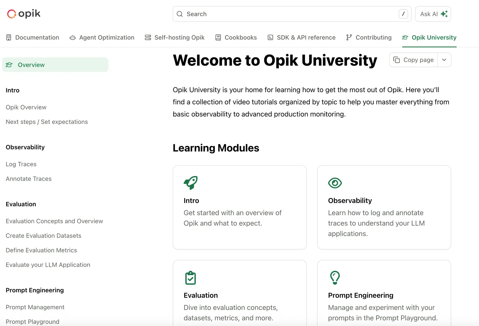 Opik University documentation section showing video guides and tutorials