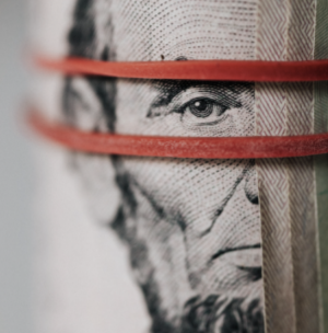 zoomed in picture of Abraham Lincoln with 2 red lines across his face